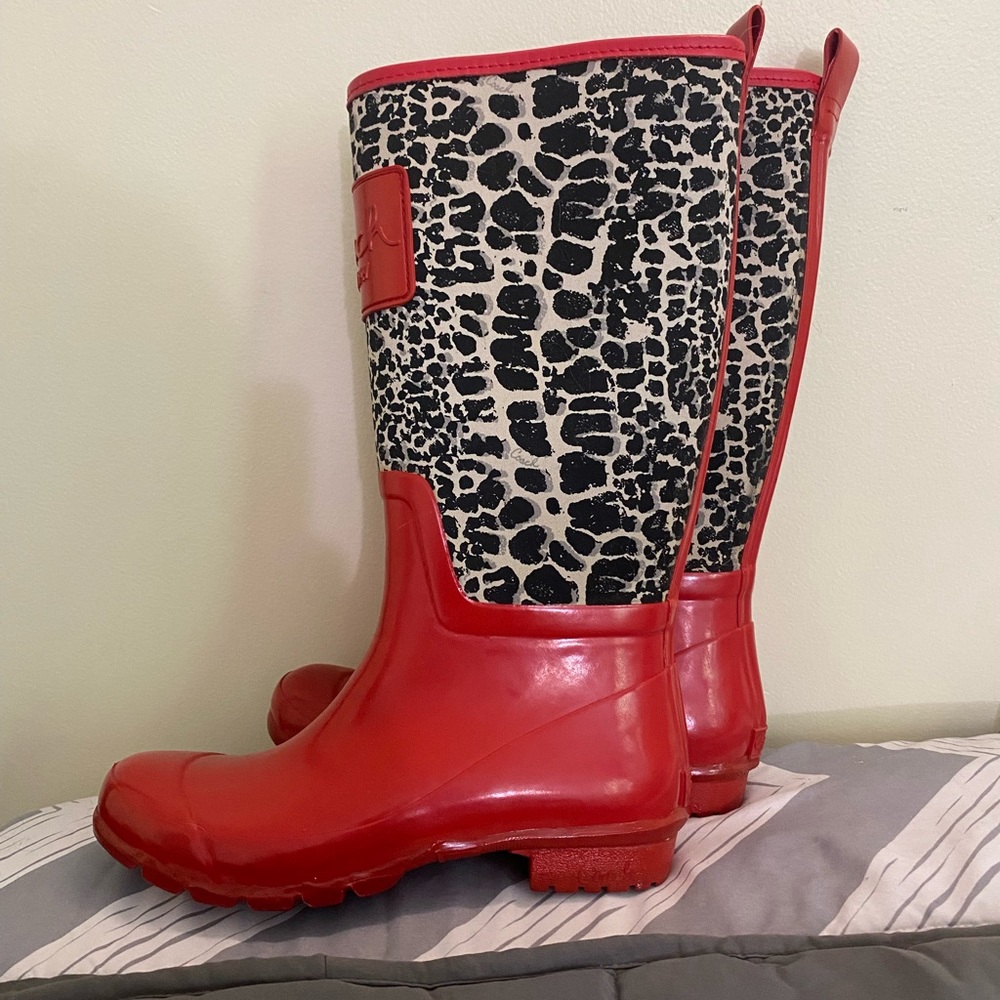 Coach rain boots, size 7R, red and animal print.